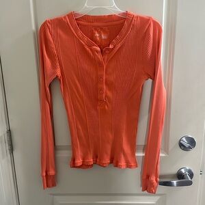 Orange long sleeve, button up shirt